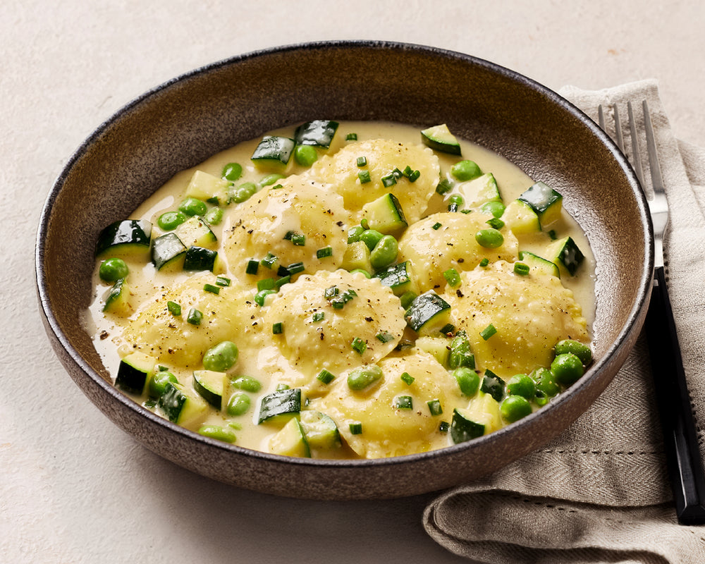 Cacio e Pepe Ravioli, Brown Butter Sauce & Greens