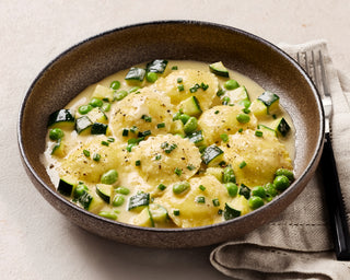 Cacio e Pepe Ravioli, Brown Butter Sauce & Greens