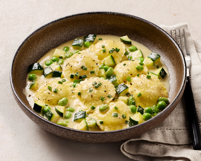Cacio e Pepe Ravioli, Brown Butter Sauce & Greens