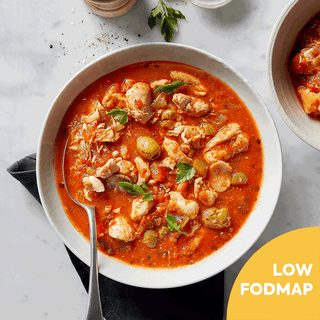 Indulge in a hearty and flavorful meal with our Low FODMAP Chicken Cacciatore. Made with free-range chicken, ripe tomatoes, olives, and aromatic herbs, this classic Italian dish is slow-cooked to perfection for a truly satisfying taste. Served with crispy potato wedges on the side, this meal is a comfort food favorite. And yes, it's also FODMAP-friendly!