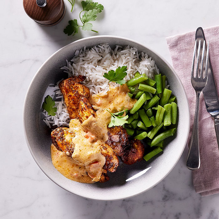Cajun Chicken with Rice & Green Beans in a bowl. 