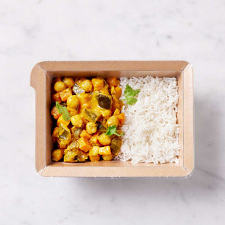 A photograph of LOW FODMAP Southern Indian Vegetable Curry with Basmati Rice, a delicious and healthy meal made with a blend of fragrant Indian spices and low FODMAP vegetables