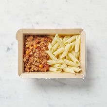 A photograph of Low FODMAP Beef Bolognese with Penne, a delicious and healthy pasta dish. With Low FODMAP Beef Bolognese with Penne, you can enjoy a delicious and satisfying pasta dish that's both healthy and low in FODMAPs.
